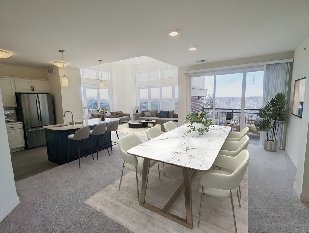 a dining room and living room with a table and chairs