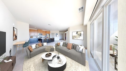 A living room with a grey couch and a coffee table.