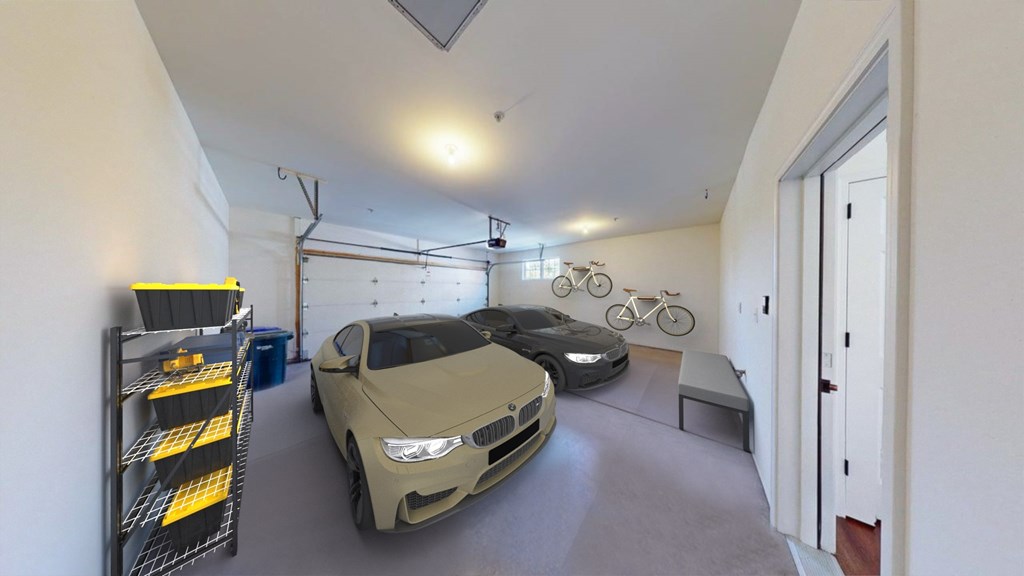A car is parked in a garage with a bicycle hanging from the ceiling.