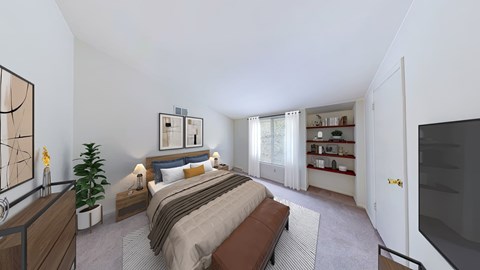 A bedroom with a large bed and a television.