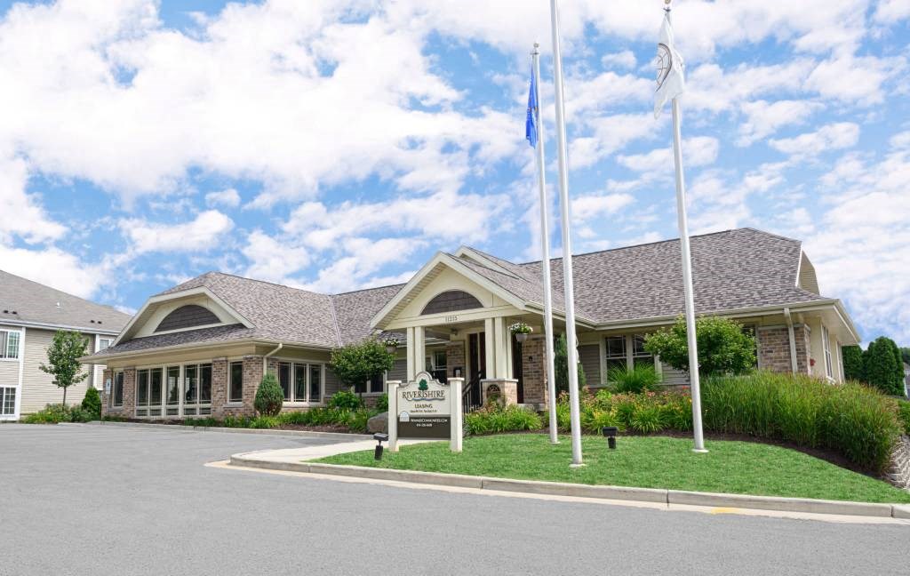 a building with two flags in front of it