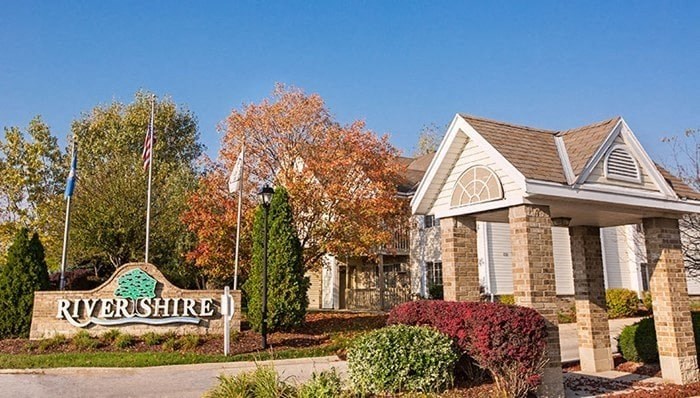 a house with a street sign in front of it