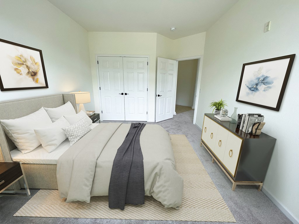 a bedroom with a bed and two closets and a dresser