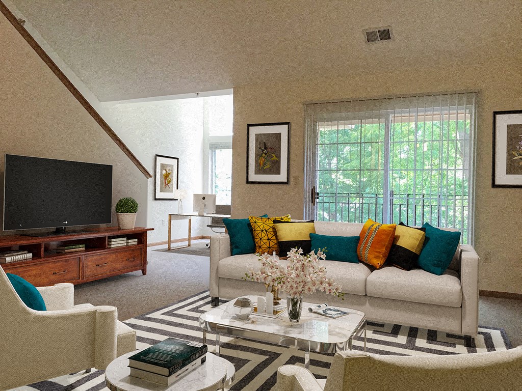 a living room with a couch and a table and a television