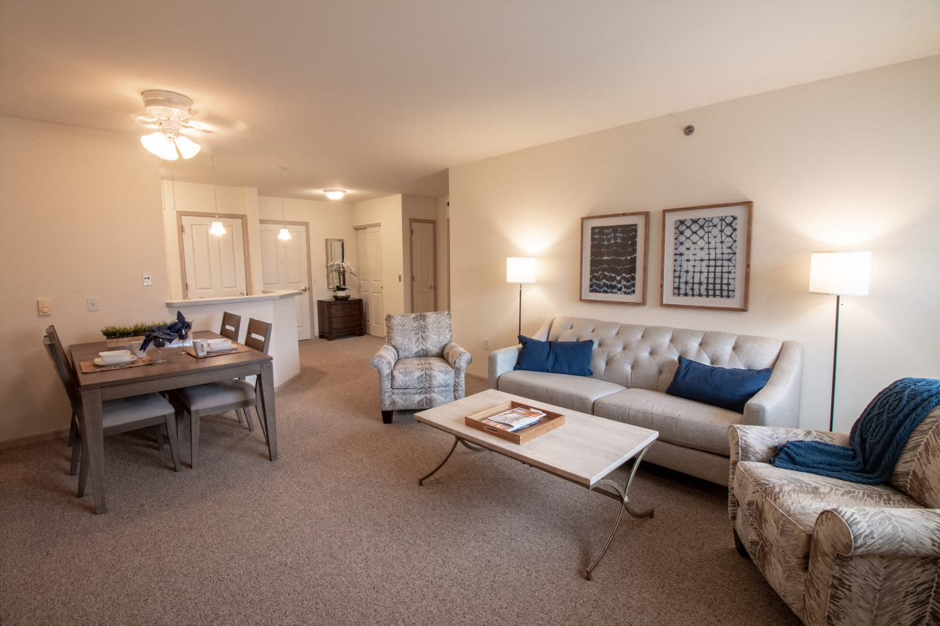 a living room with a couch and a table