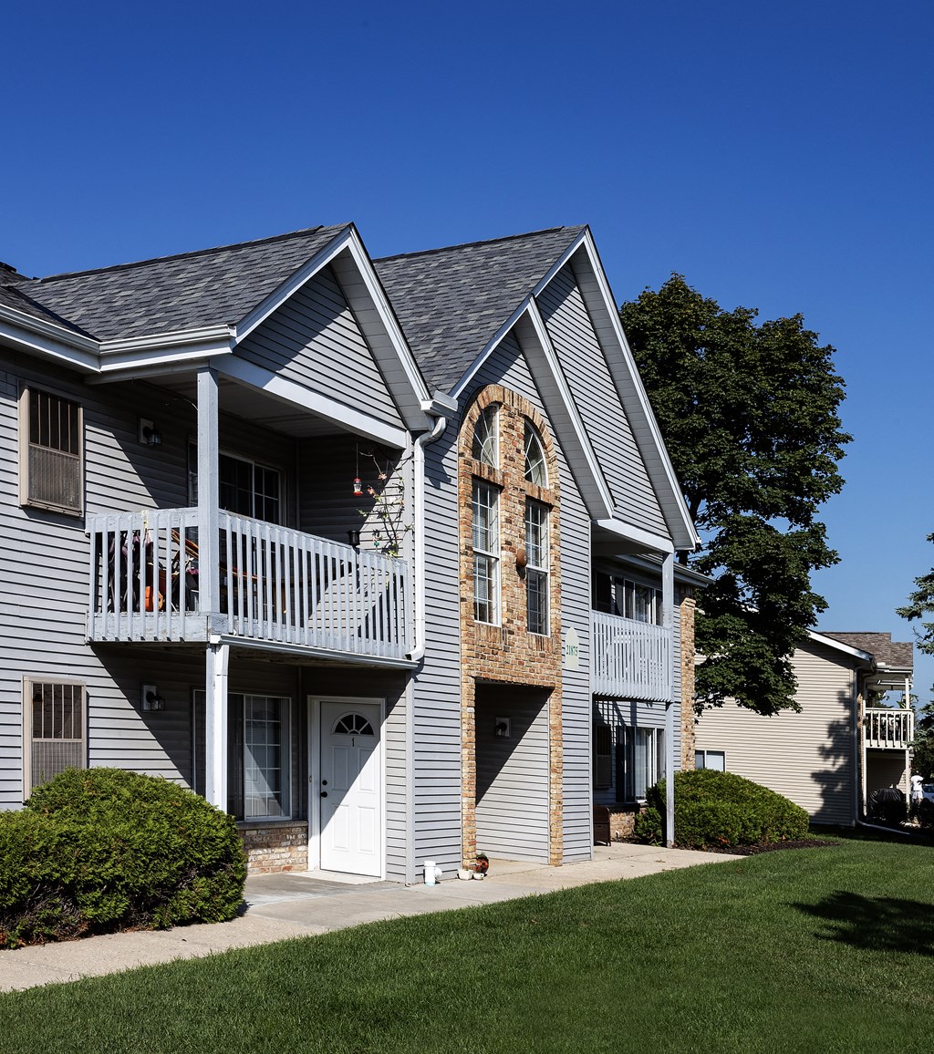 a house with a porch on the side of it