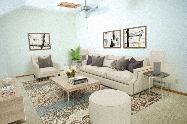 a living room with a white couch and tables