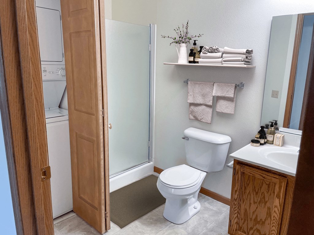 a small bathroom with a toilet and a shower