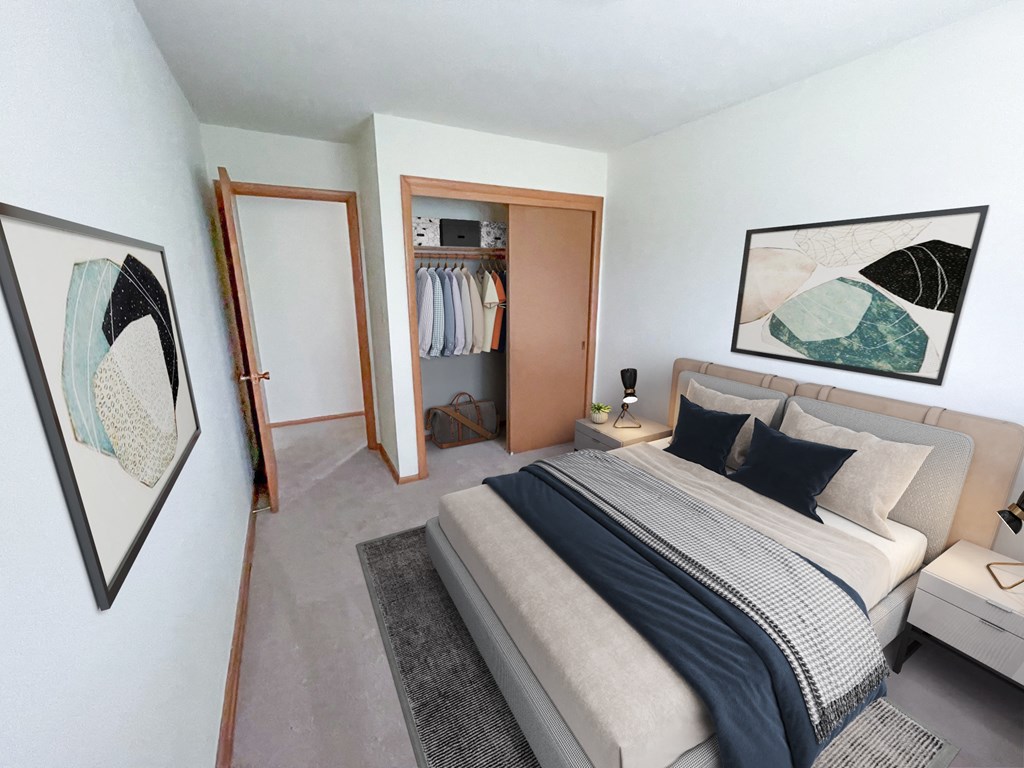 a bedroom with a bed and a closet