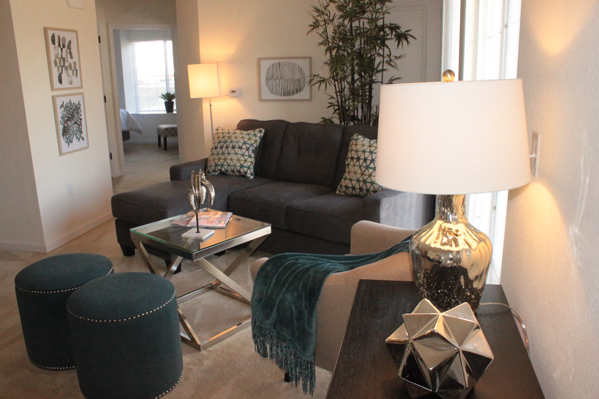 a living room with a couch and a table