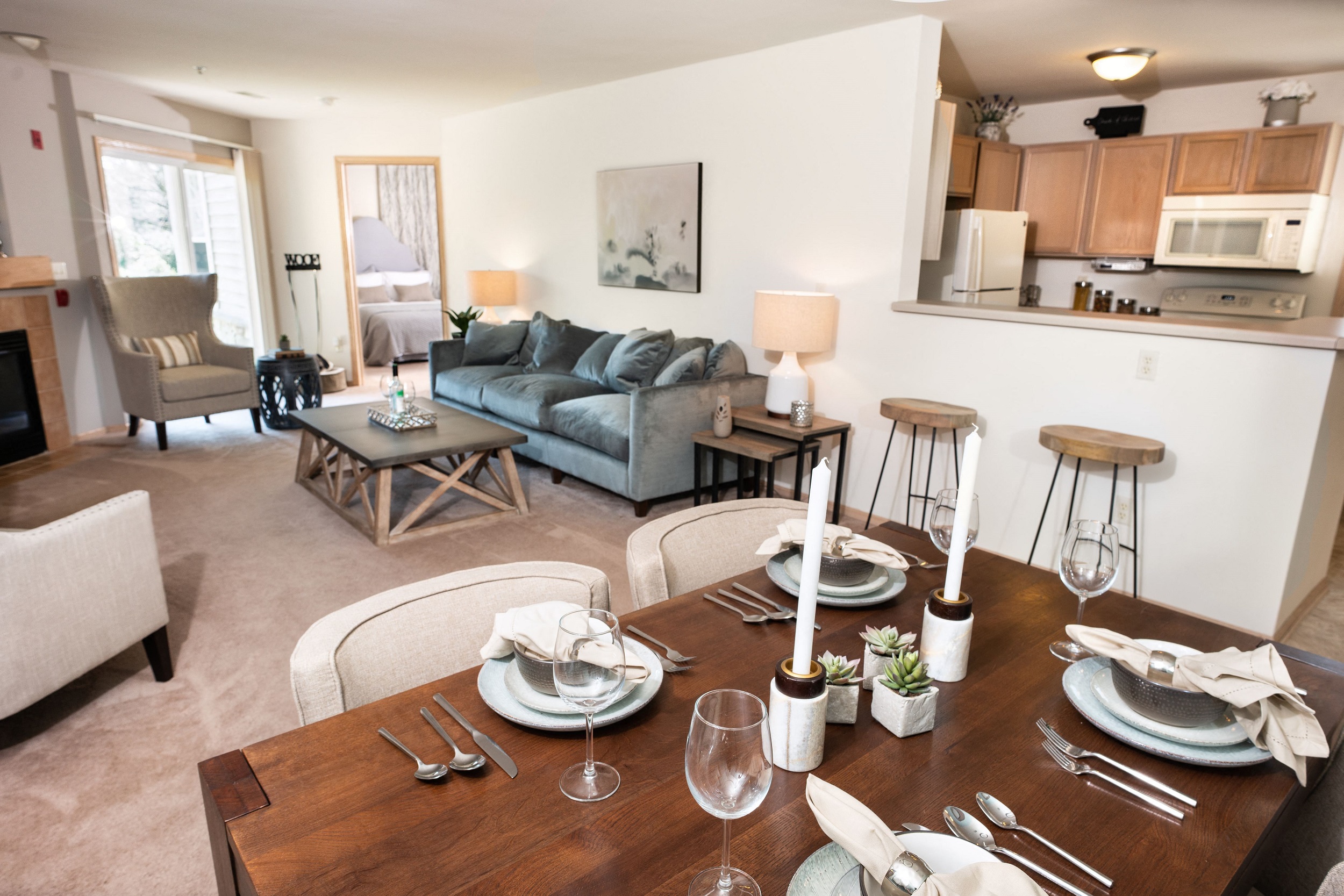 Large open-concept floor plans with breakfast bar and dining area