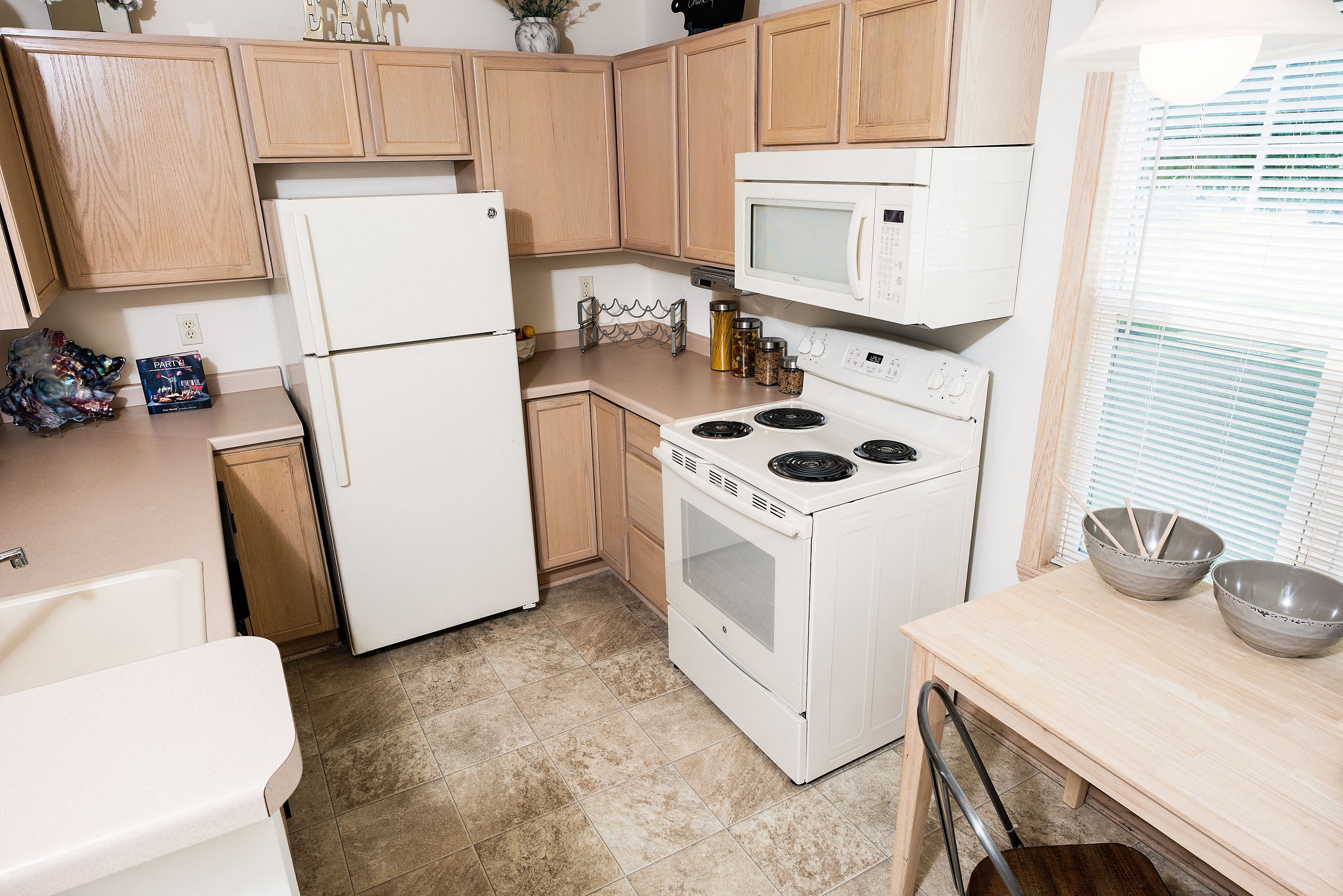 Bright kitchens with ample cabinet space and light