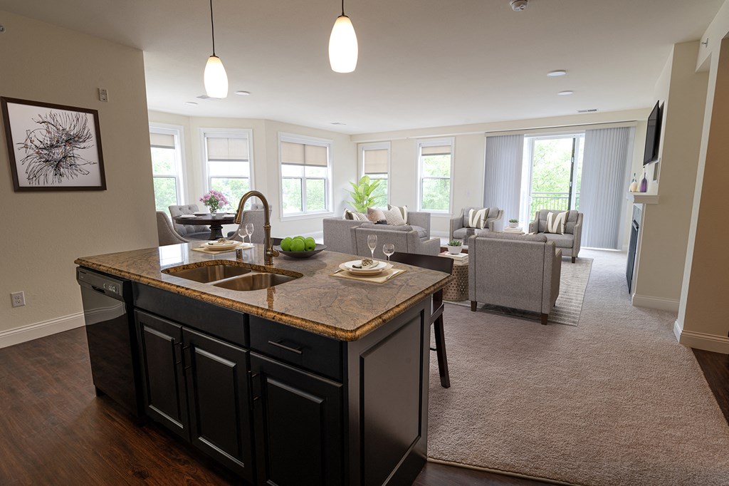 a kitchen and living room in a new home