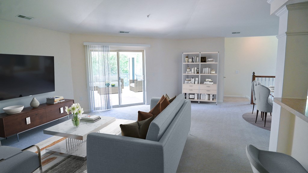 a living room with a couch and a table and a television