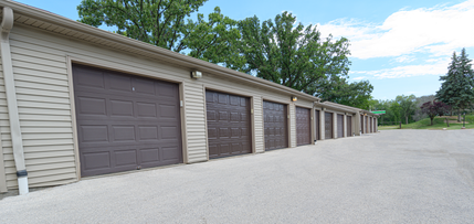 a row of garage doors on the side of a building