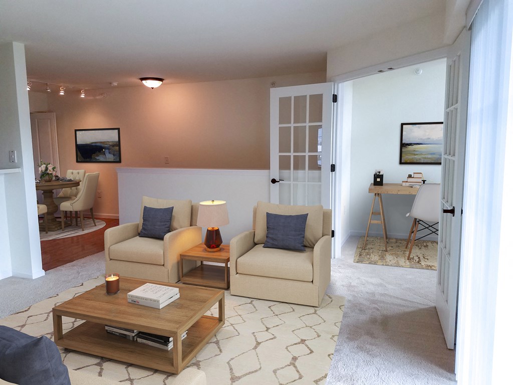 a living room with two couches and a coffee table