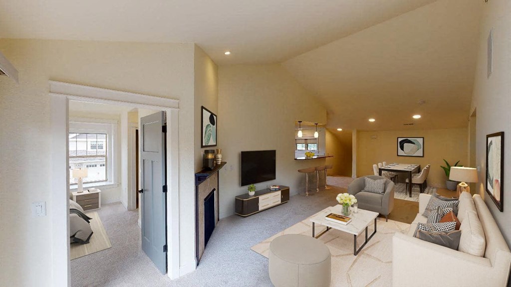 a living room with a couch and a table