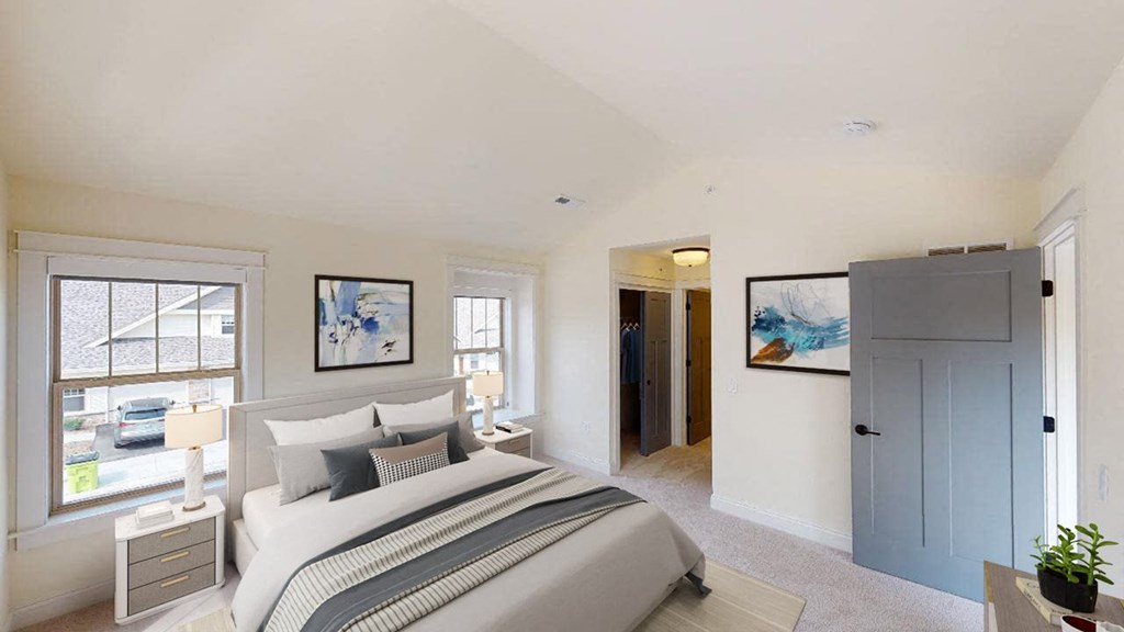 a bedroom with a bed and a closet