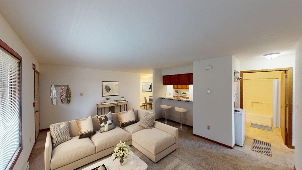 a living room with a couch and a table