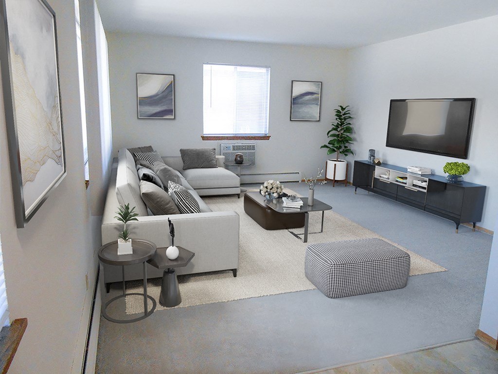 a living room with a couch and a tv