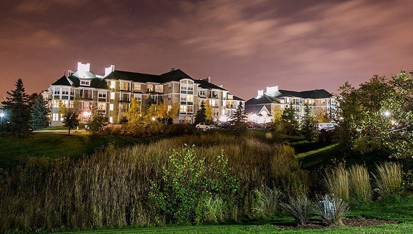 a view of the apartment complex at night