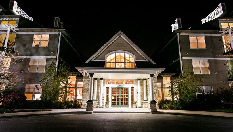 a night shot of the front of the hotel