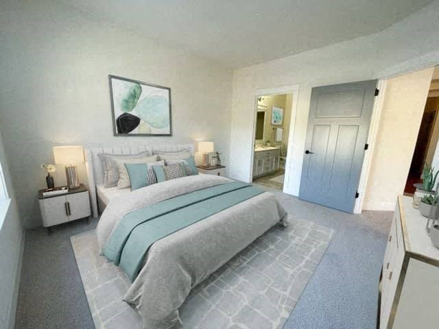 a bedroom with a bed and a closet