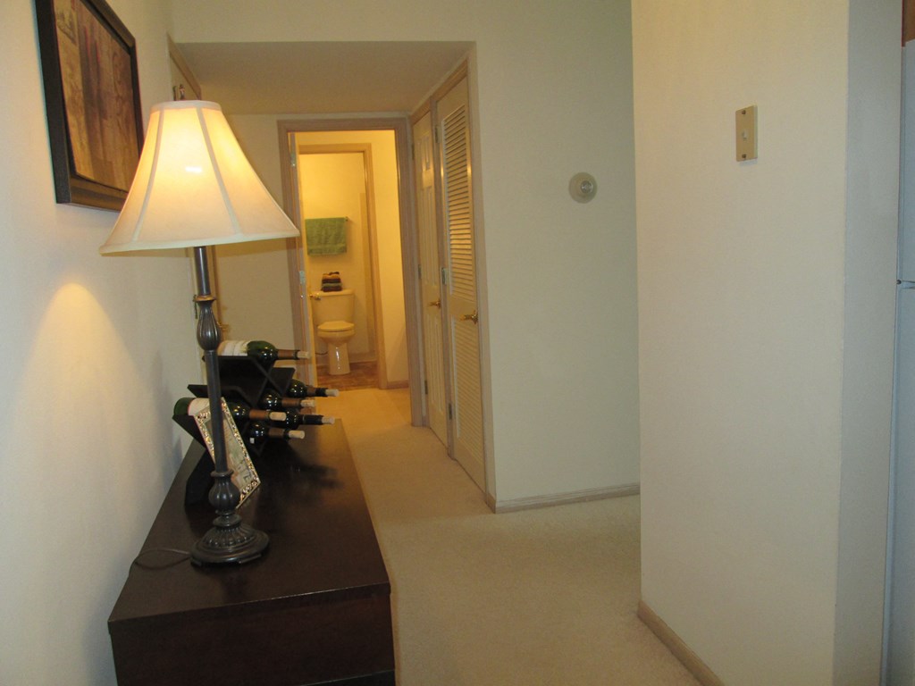 a view of the hallway from the living room