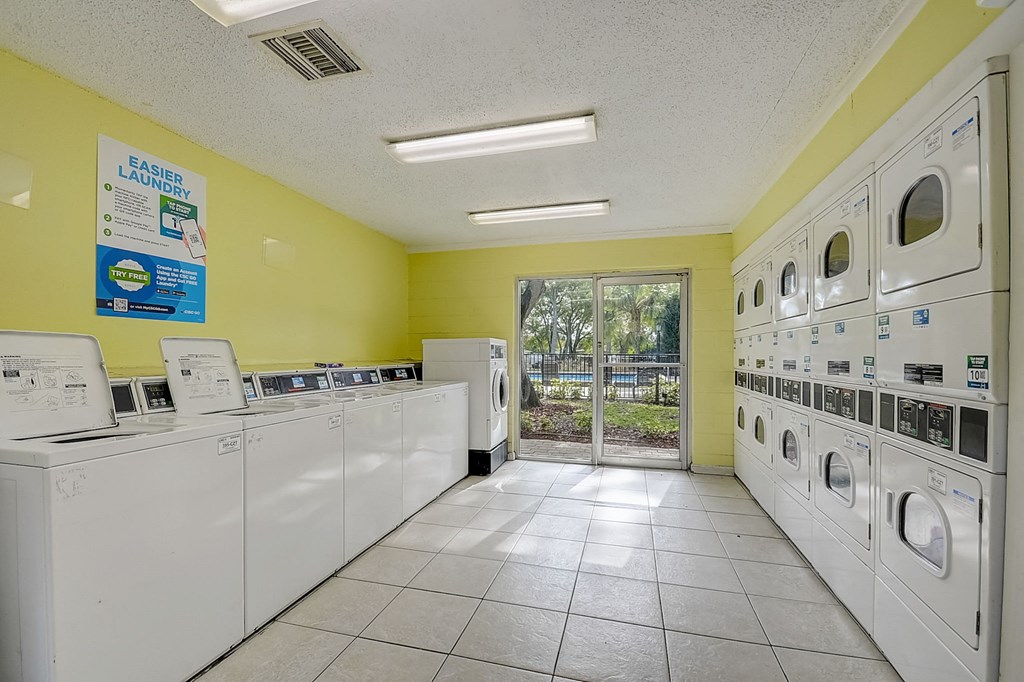 Clothing Care and Laundry Center at Fernwood Grove Apartments at 4900 MacDill Ave in Tampa, Florida