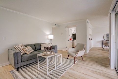 a living room with a couch and a coffee table
