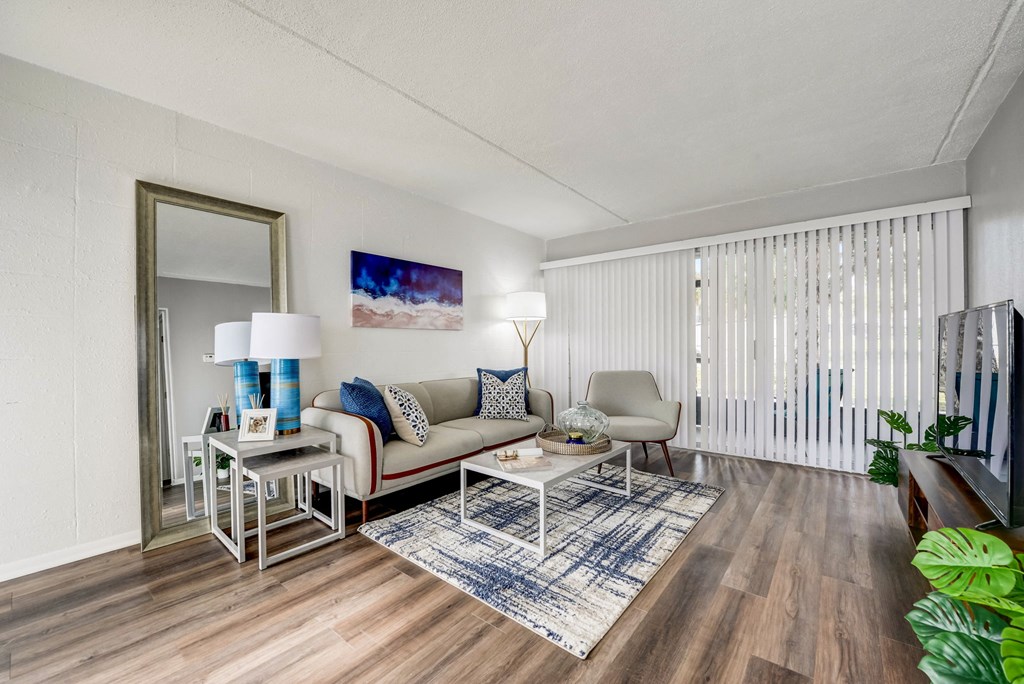 a living room with a couch and a table