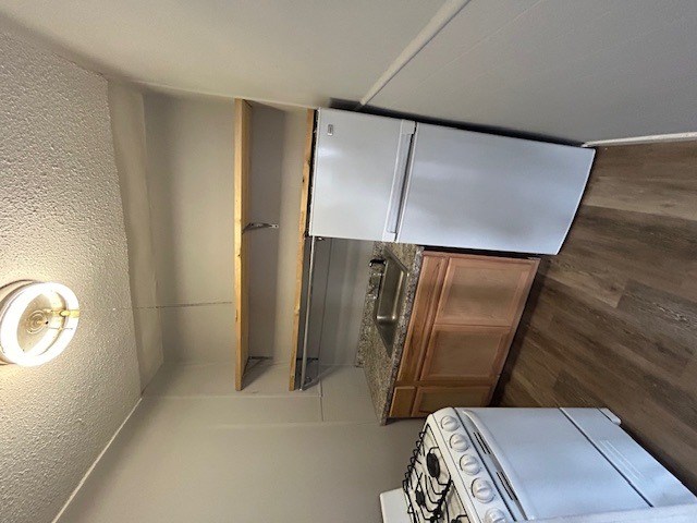a small bathroom with a closet and a mirror