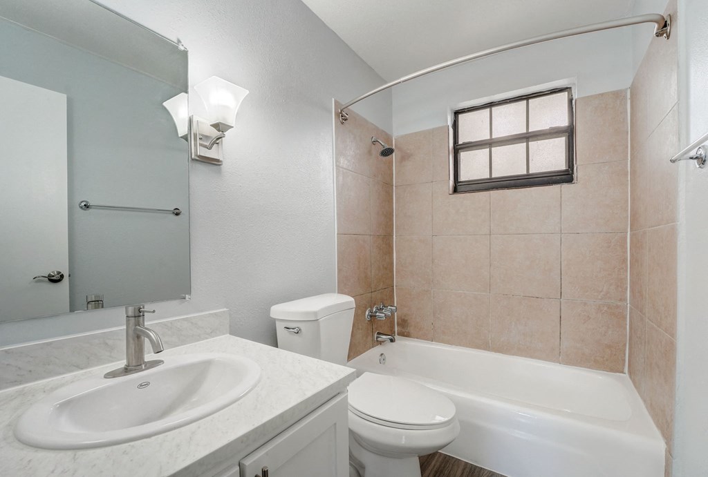 Renovated Apartment Home Bathroom at The Flats at Seminole Heights at 4111 N Poplar Ave in Tampa, FL