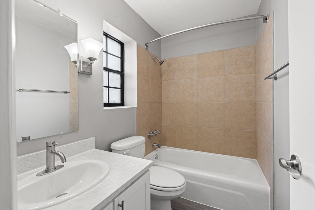 Large Soaking Tub In Master Bathroom With A Tile Surround at The Flats at Seminole Heights, Tampa, 33603