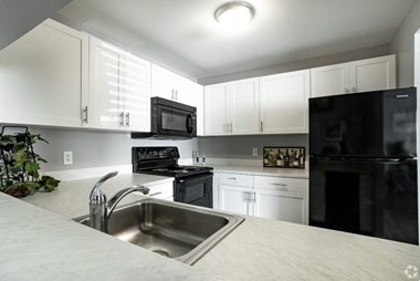 Kitchen Sink at Centerpointe Apartments, Canandaigua, New York - Photo Gallery 4