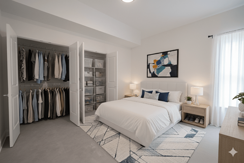 A bedroom with a large bed and a wardrobe.
