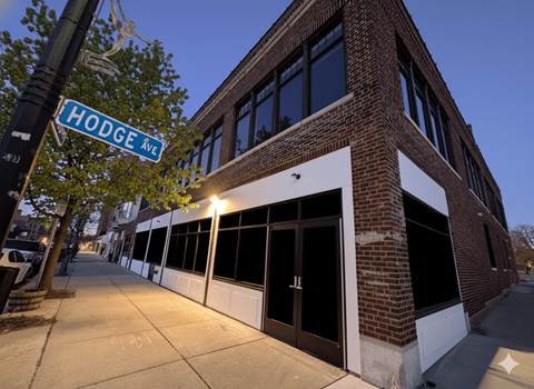 A street view of Hodge Ave with a building on the right.