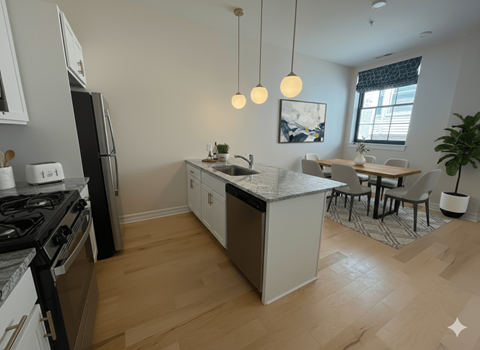 A kitchen with a black stove top oven and a black refrigerator.