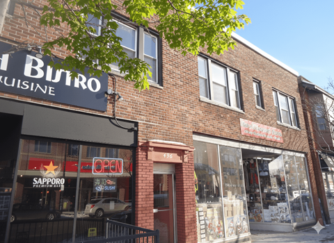 A brick building with a sign that says Butro Kuisine.