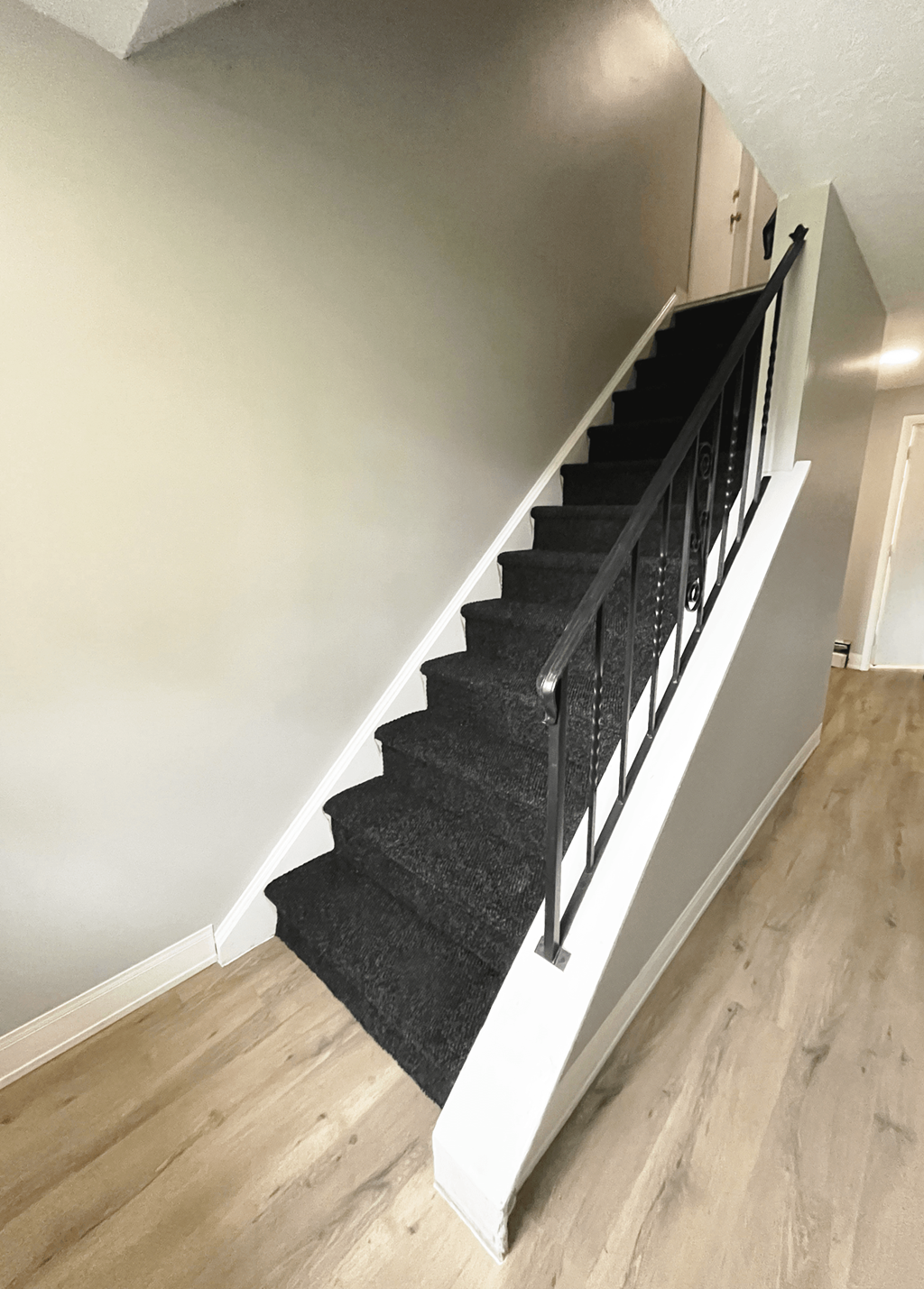 a view of the stairway from the bottom of the stairs at Highview Manor Apartments, Fairport, NY, 14450
