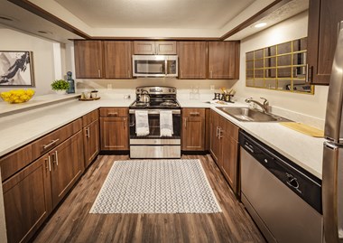 Fully Equipped Kitchen Includes Frost-Free Refrigerator, Electric Range, & Dishwasher at Castle Point Apartments, South Bend, Indiana - Photo Gallery 5