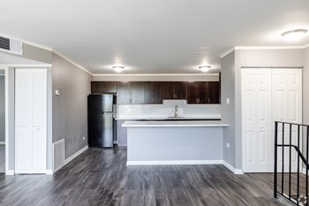 Unfurnished living with kitchen Renovated Living Room at Woodland Ridge Apartments in Woodridge, IL - Photo Gallery 6
