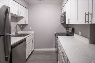 Renovated Apartment Home Kitchen at Fernwood Grove Apartments in Tampa Florida