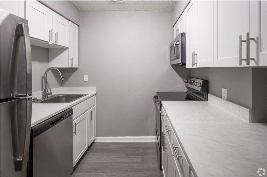 Renovated Apartment Home Kitchen Renovated Apartment Home Kitchen at Fernwood Grove Apartments in Tampa Florida