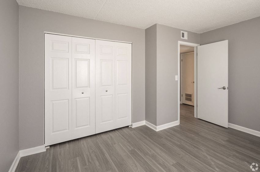 Renovated Apartment Home Bedroom Renovated Apartment Home Bedroom at Fernwood Grove Apartments in Tampa Florida