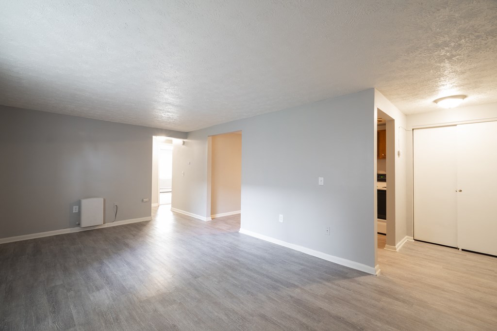 Renovated Living Room area with window light `at Willowbrooke Apartments & Townhomes at 396 Willowbrooke Drive in Brockport, NY 14420