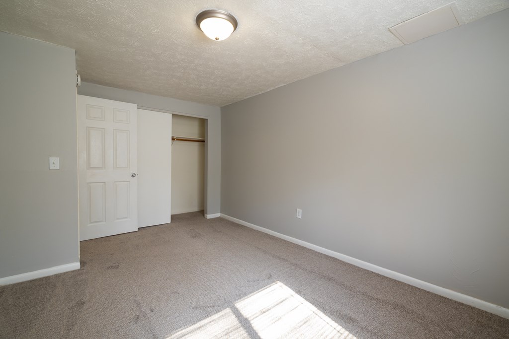 Open Living Room at Willowbrooke Apartments & Townhomes at 396 Willowbrooke Drive in Brockport, NY 14420