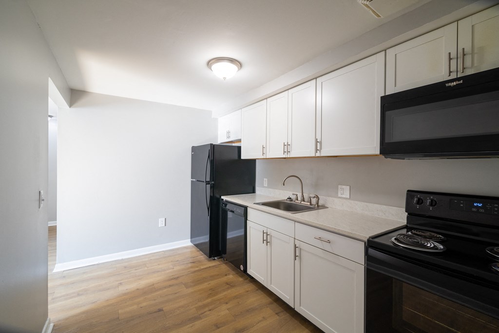 Renovated Kitchen with light at Willowbrooke Apartments & Townhomes at 396 Willowbrooke Drive in Brockport, NY 14420
