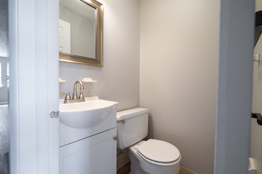 Renovated Bathroom with toilet  at Willowbrooke Apartments & Townhomes at 396 Willowbrooke Drive in Brockport, NY 14420