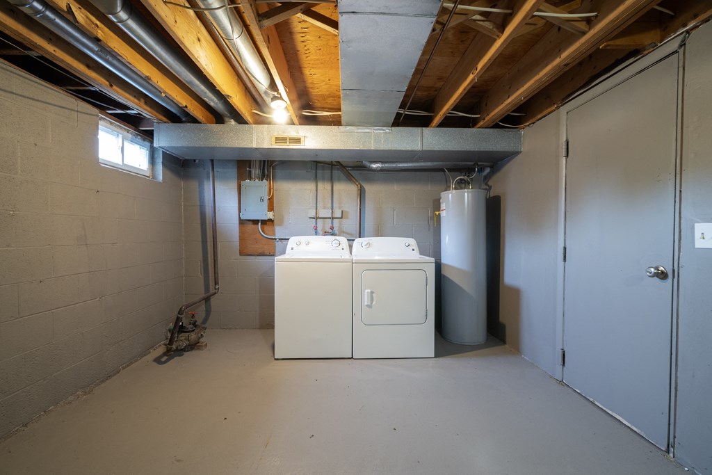 Townhome Laundry Area at Willowbrooke Apartments & Townhomes at 396 Willowbrooke Drive in Brockport, NY 14420